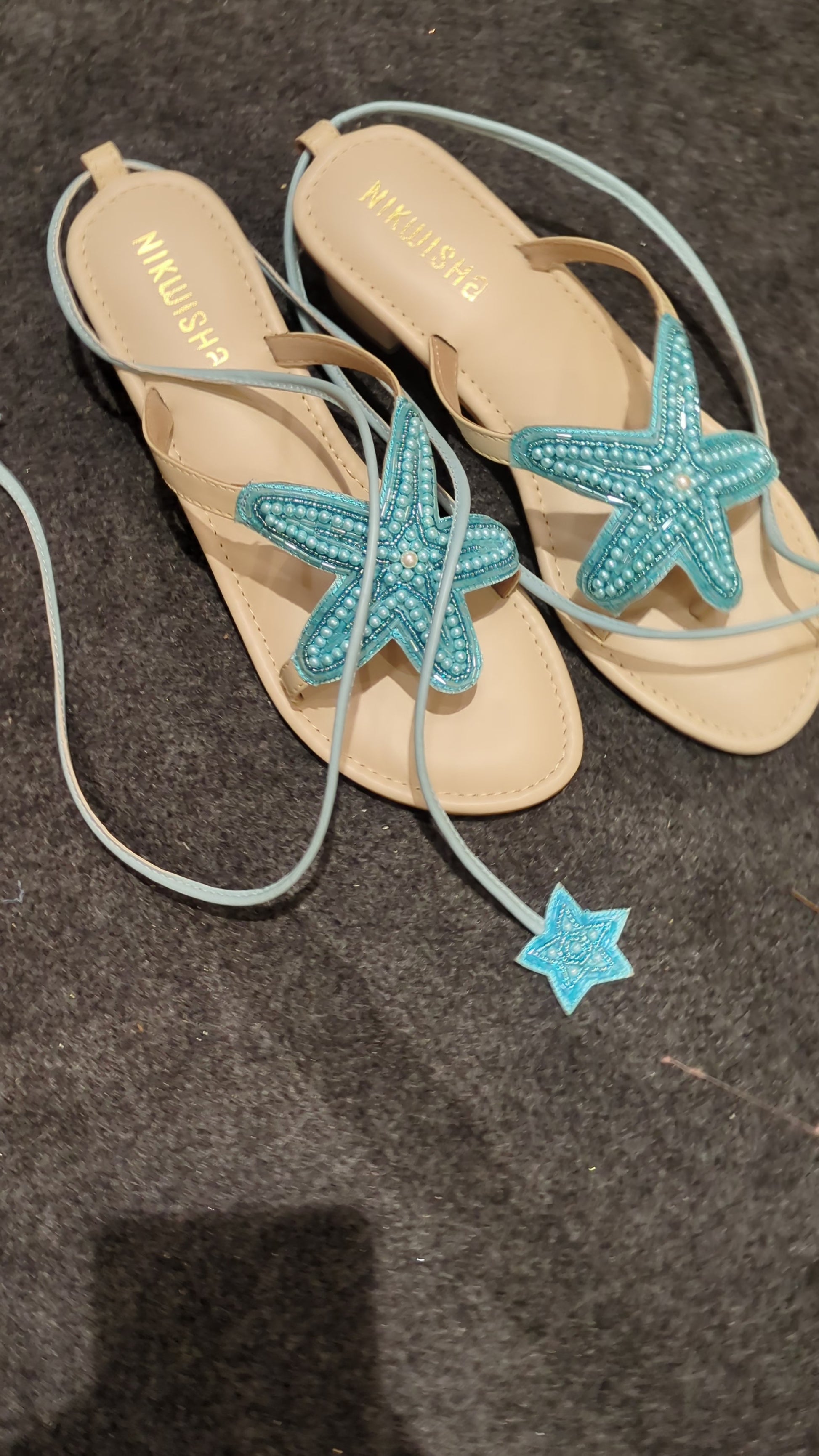 Blue Starfish sandals with lace tie ups