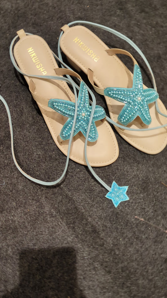 Blue Starfish sandals with lace tie ups
